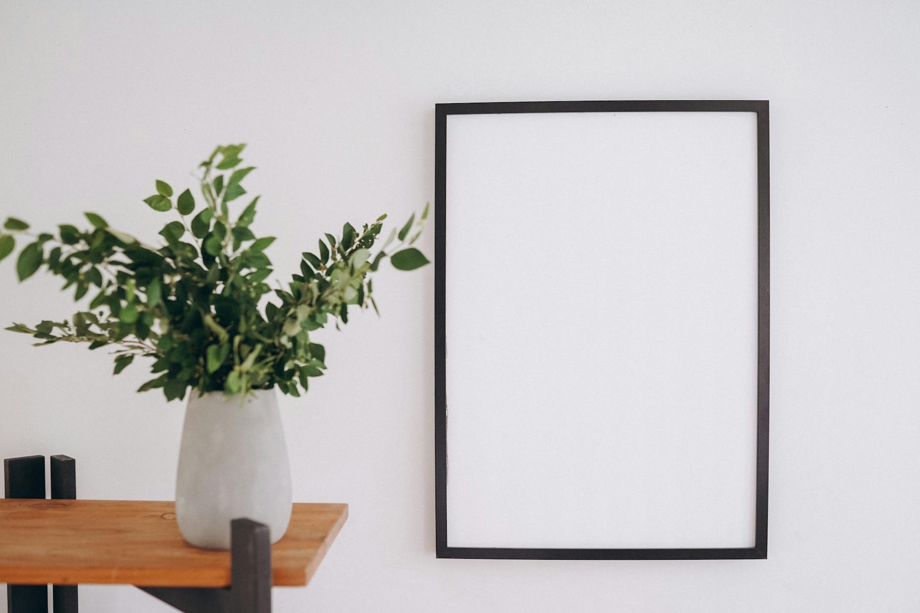 Styled mid century modern poster in cozy living room